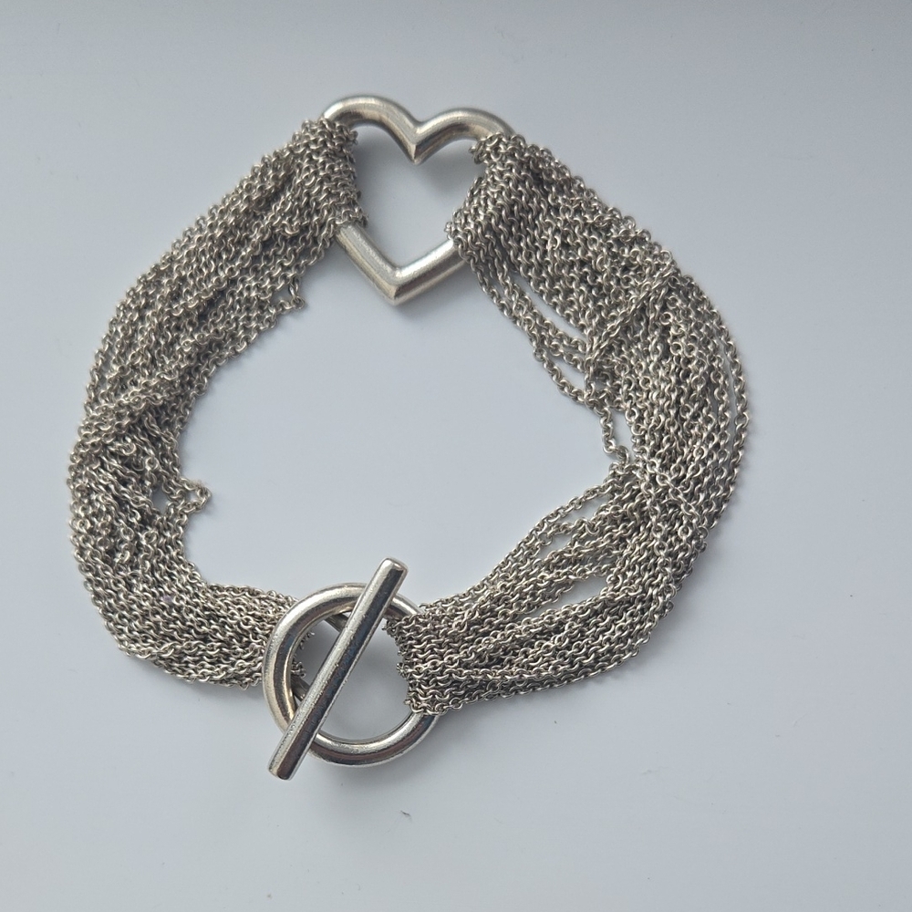 Tiffany and Co. Heart charm multi strand chain bracelet with toggle closure
